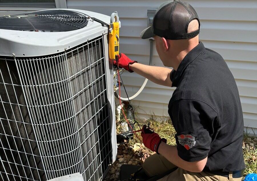 Hvac Tech Repairing Air Conditioner
